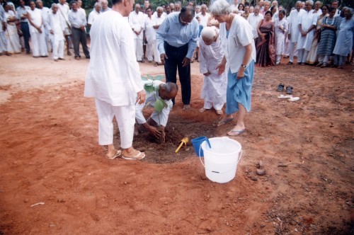 Nirod-planting-supramental-sun-tree-at-Savitri-Bhavan.jpg