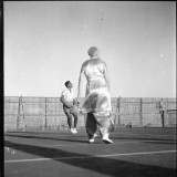 Mother-Playing-Tennis--80