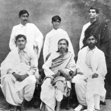 Nolini-Kanta-Gupta-seated-extreme-right-with-Sri-Aurobindo-Bijoy-Nag-seated-extreme-left-and-Suresh-Chandra-Chakraborty-alias-Moni-standing-behind-Nolini-Kanta.