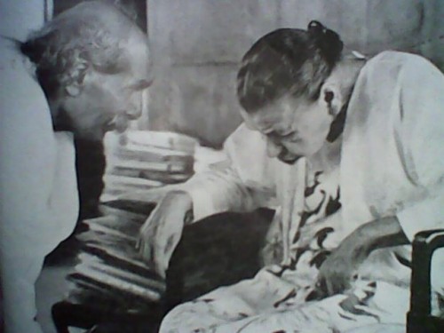 Nolini Kanta Gupta with the Mother.