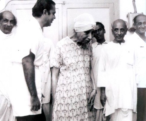 The Mother at the Ashram Press on 23 August 1961 with Nolini Kanta Gupta, Robi Ganguly, Amrita and U