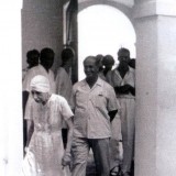 The-Mother-at-the-inauguration-of-Senteurs-in-September-1958.-Behind-the-Mother-are-Tanmaya-Udar-Pinto-Nolini-Kanta-Gupta-and-Gautam.