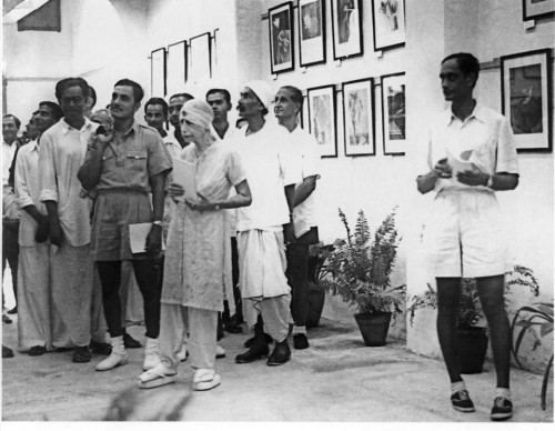 The Mother in the Exhibition Hall with Nolini Kanta, Pranab Kumar Bhattacharya and Udar Pinto.